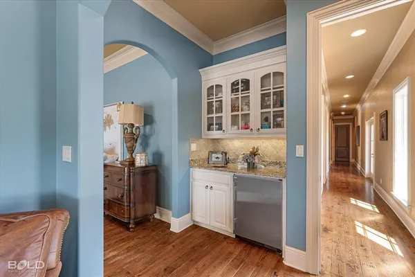 a view of a hardwood floor and workspace