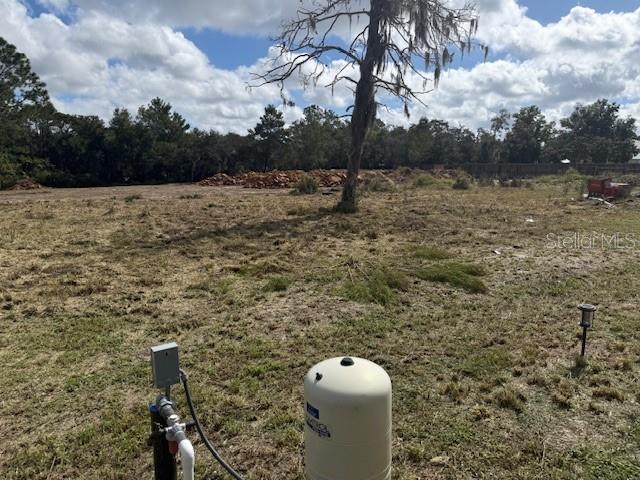 8455 A D Mims Road Orlando, FL 32818 - Photo 4 of 7 a view of a pathway of a lake view