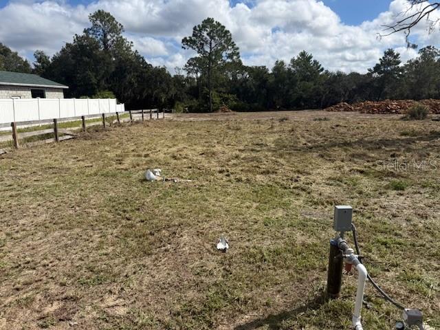 8455 A D Mims Road Orlando, FL 32818 - Photo 5 of 7 a view of open area with yard