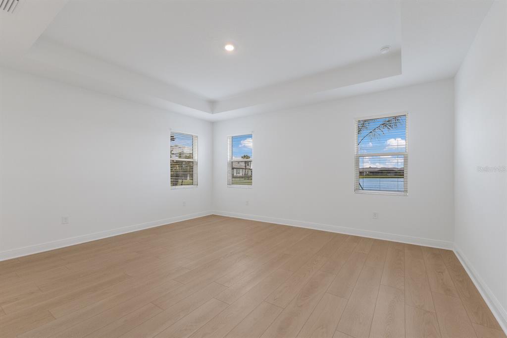 4611 Sweet Retreat Run Lakewood Ranch, FL 34211 - Photo 18 of 37 a view of an empty room with a window