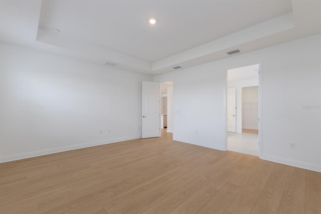 4611 Sweet Retreat Run Lakewood Ranch, FL 34211 - Photo 19 of 37 a view of an empty room