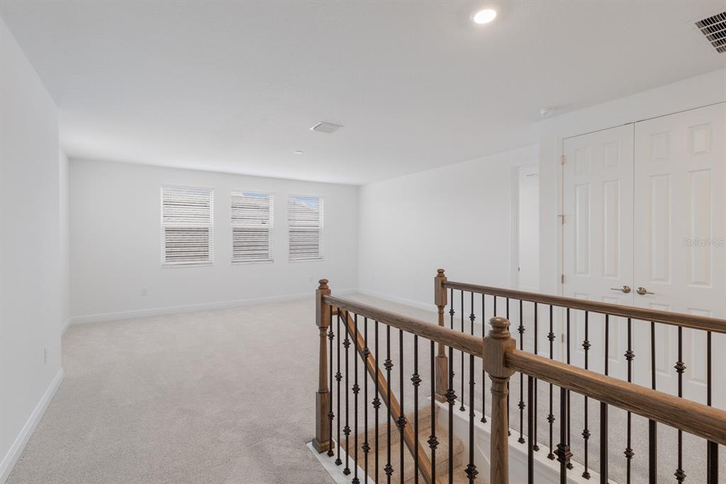 4611 Sweet Retreat Run Lakewood Ranch, FL 34211 - Photo 23 of 37 a view of hallway with a window
