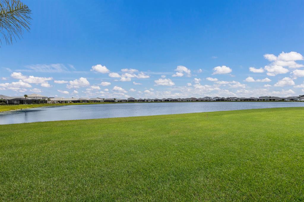 4611 Sweet Retreat Run Lakewood Ranch, FL 34211 - Photo 32 of 37 a view of a lake in middle of the house
