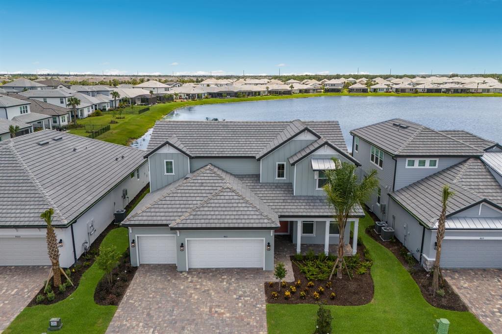 4611 Sweet Retreat Run Lakewood Ranch, FL 34211 - Photo 33 of 37 an aerial view of a house with a garden