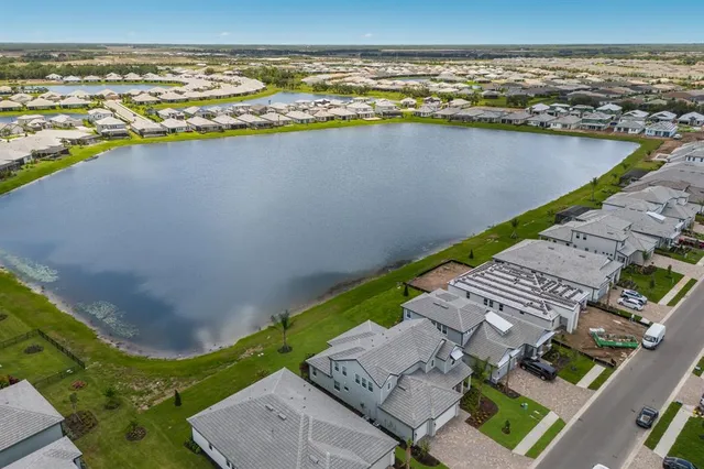 an aerial view of a house with a garden