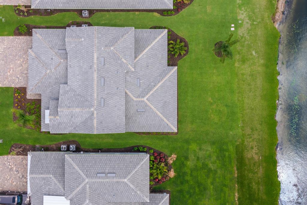 4611 Sweet Retreat Run Lakewood Ranch, FL 34211 - Photo 37 of 37 an aerial view of a house with a garden