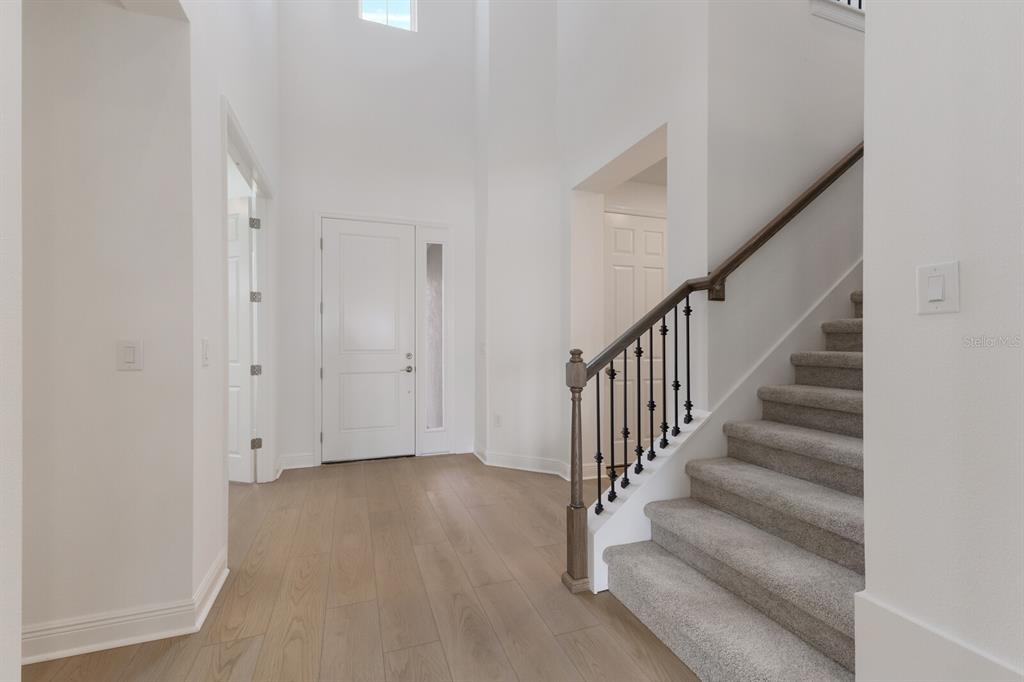 4611 Sweet Retreat Run Lakewood Ranch, FL 34211 - Photo 5 of 37 a view of entryway with wooden floor