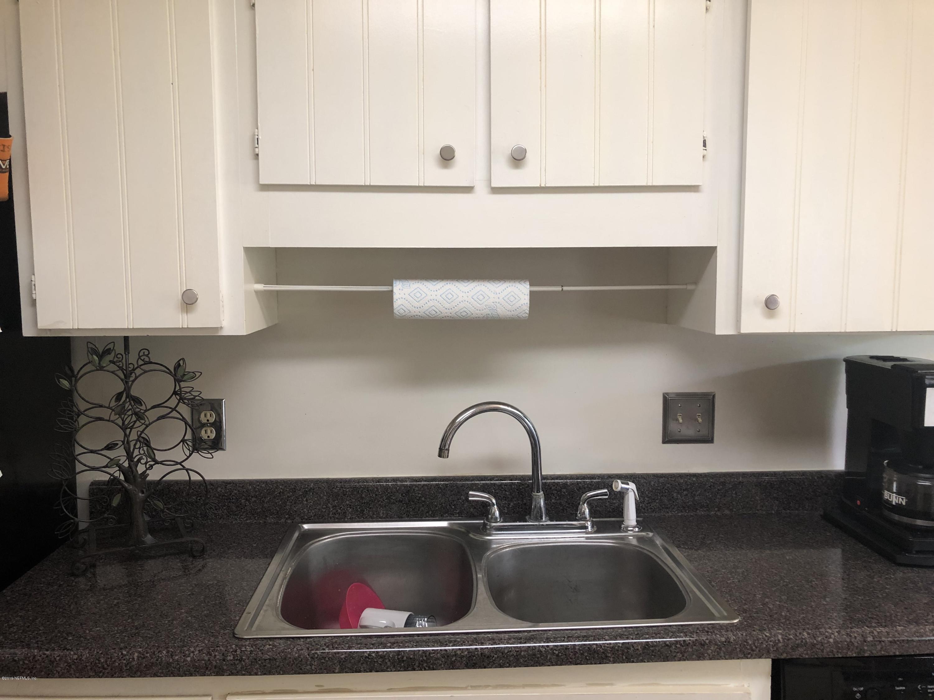 12508 Attrill Road Jacksonville, FL 32258 - Photo 8 of 14 White cabinets, double stainless sinks