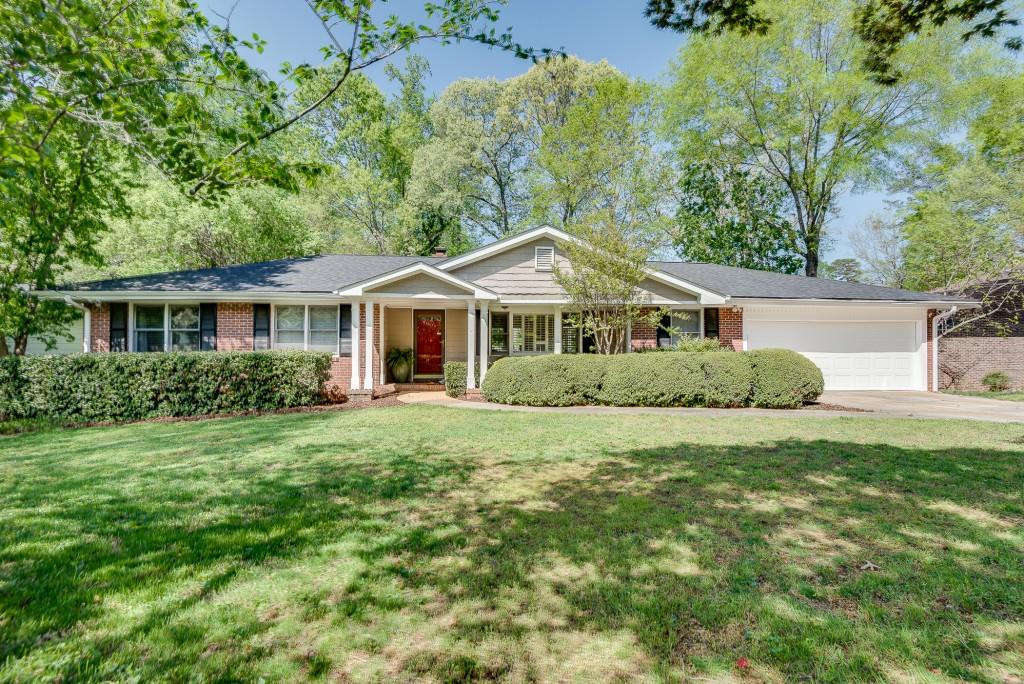 1448 Diamond Head Circle Decatur, GA 30033 - Photo 1 of 1 a front view of a house with a garden