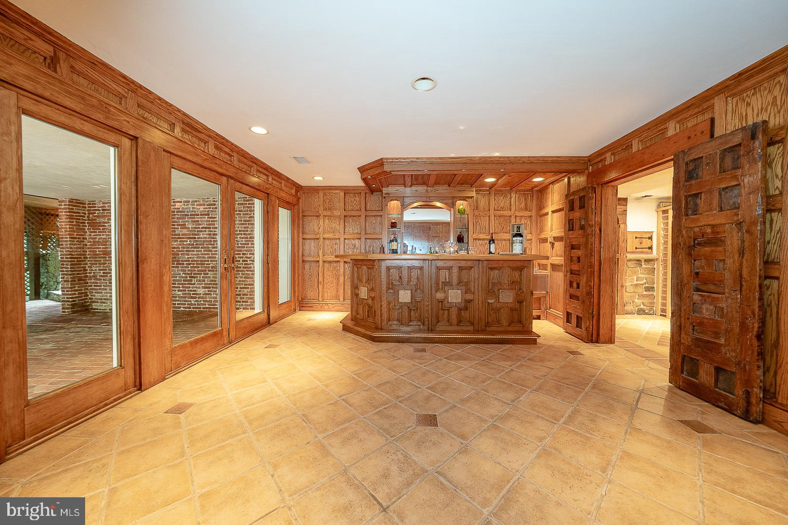 577 Tory Hill Road Devon, PA 19333 - Photo 42 of 63 Bar Area w French Doors to Covered Back Patio