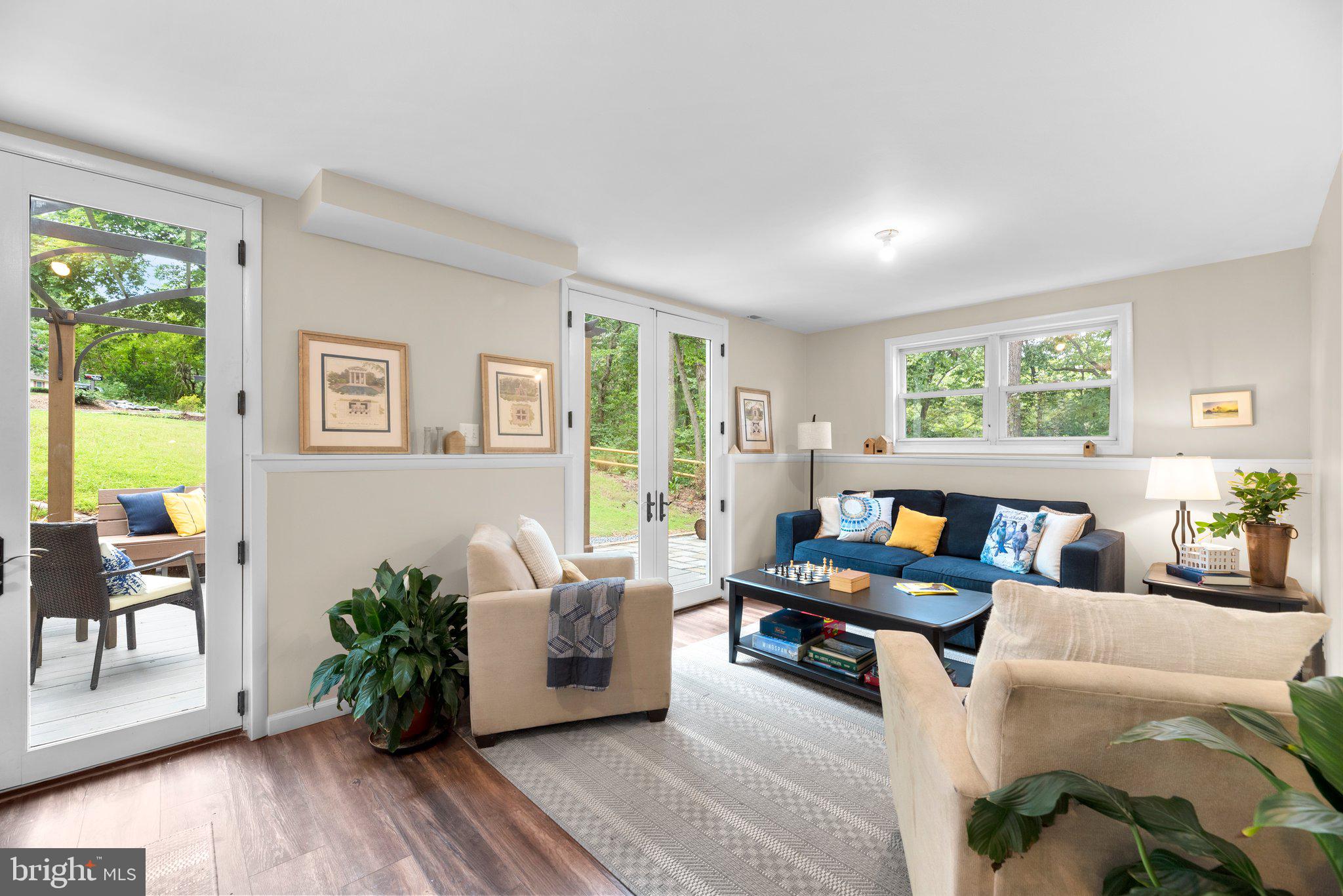 5902 Rustic Lane Elkridge, MD 21075 - Photo 20 of 65 Family room with two sets of french doors to deck