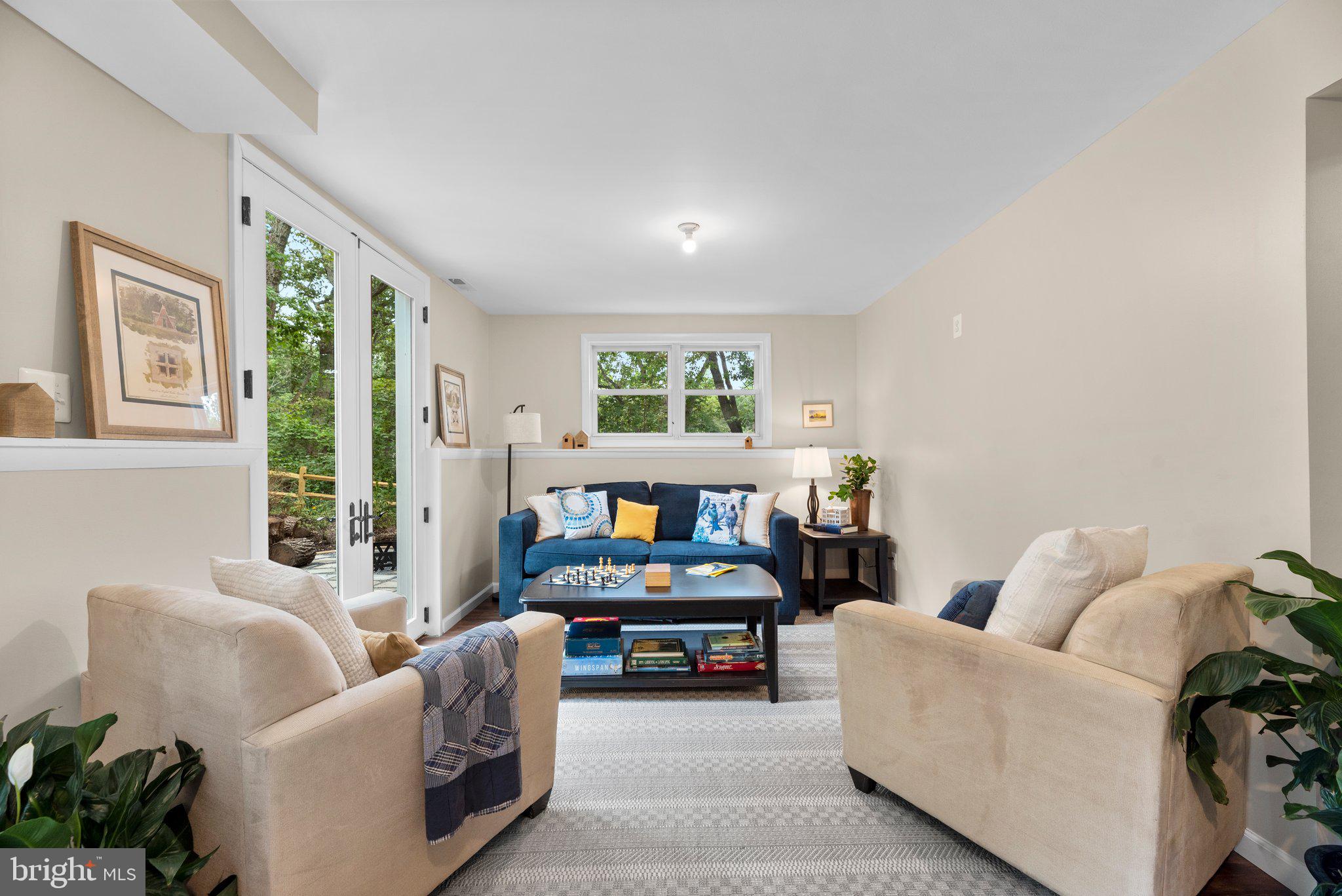 5902 Rustic Lane Elkridge, MD 21075 - Photo 25 of 65 Family room with large TV wall and deck access
