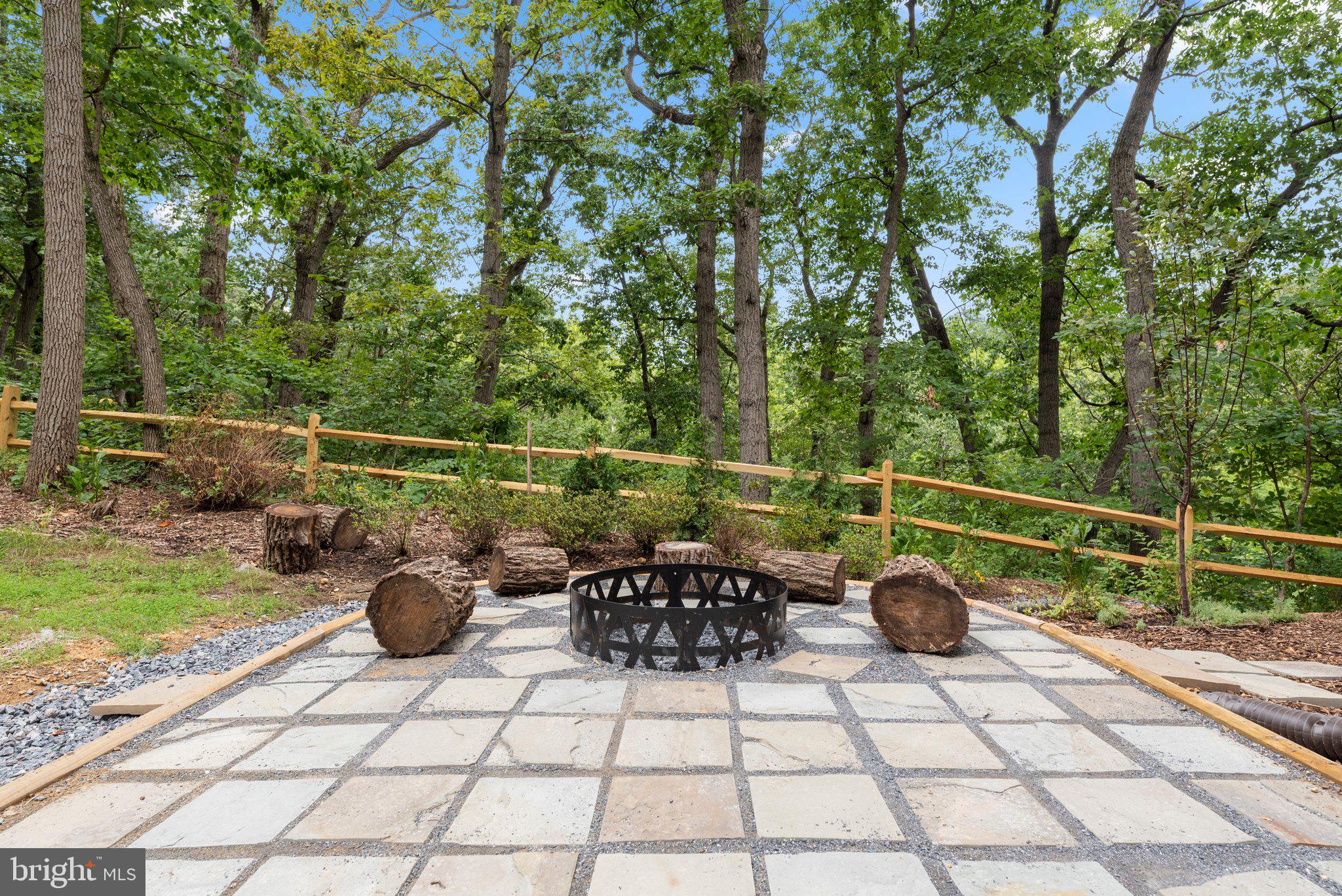 5902 Rustic Lane Elkridge, MD 21075 - Photo 30 of 65 Fire pit on the edge of the woods