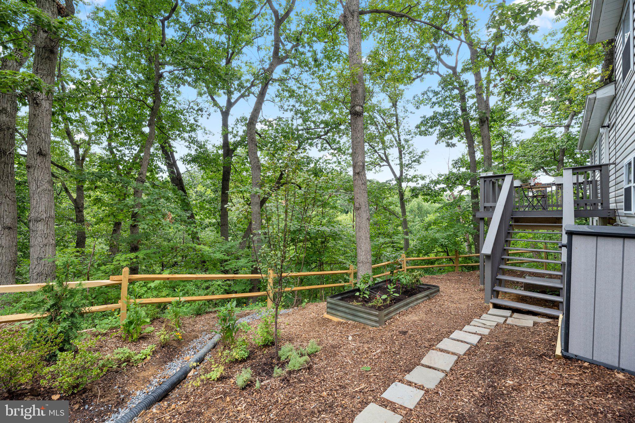 5902 Rustic Lane Elkridge, MD 21075 - Photo 7 of 65 Garden area surrounded by woods