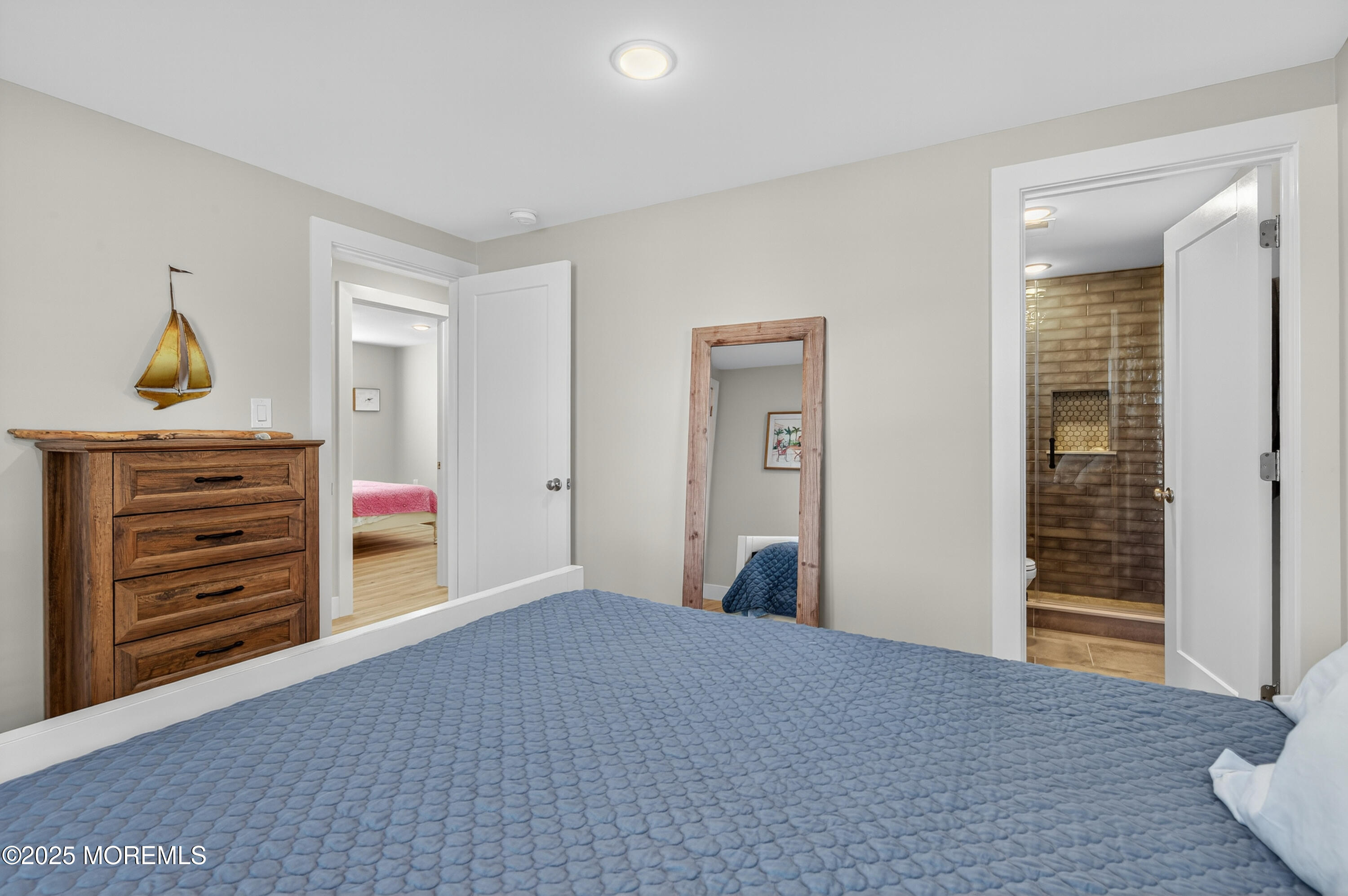 3255 Goa Way Lavallette, NJ 08735 - Photo 17 of 34 a bedroom with a bed and a dresser