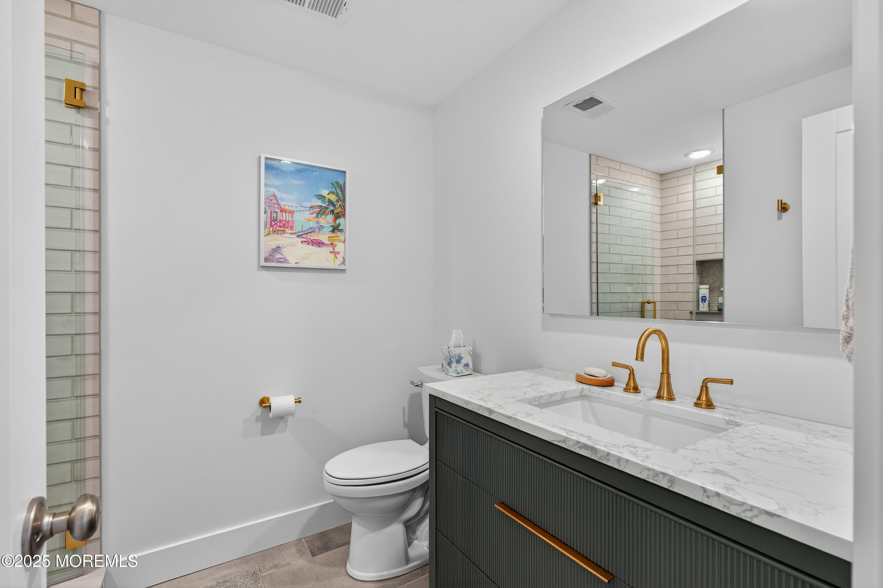 3255 Goa Way Lavallette, NJ 08735 - Photo 23 of 34 a bathroom with a granite countertop sink mirror vanity and toilet