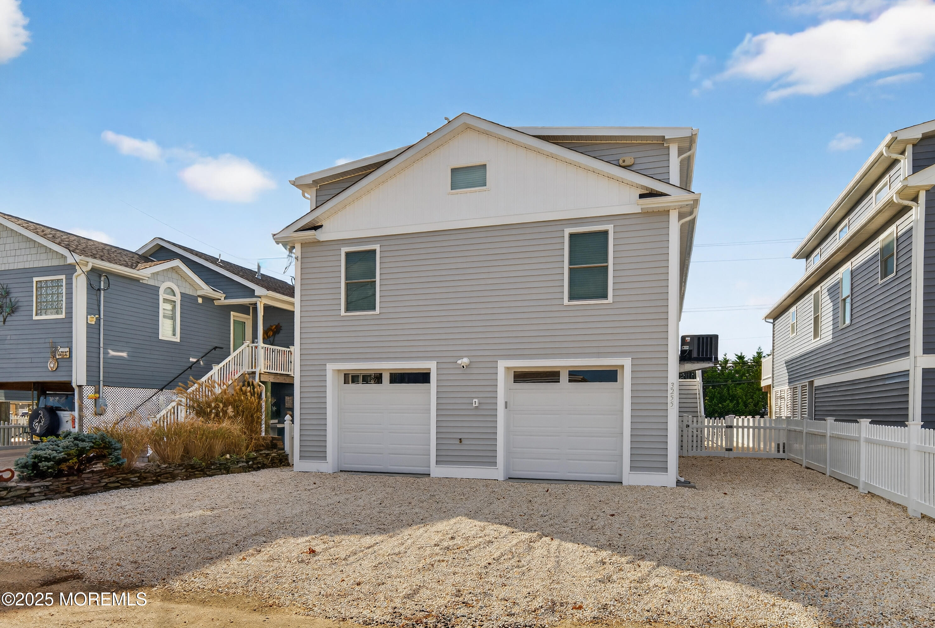 3255 Goa Way Lavallette, NJ 08735 - Photo 33 of 34 a front view of a house with a yard