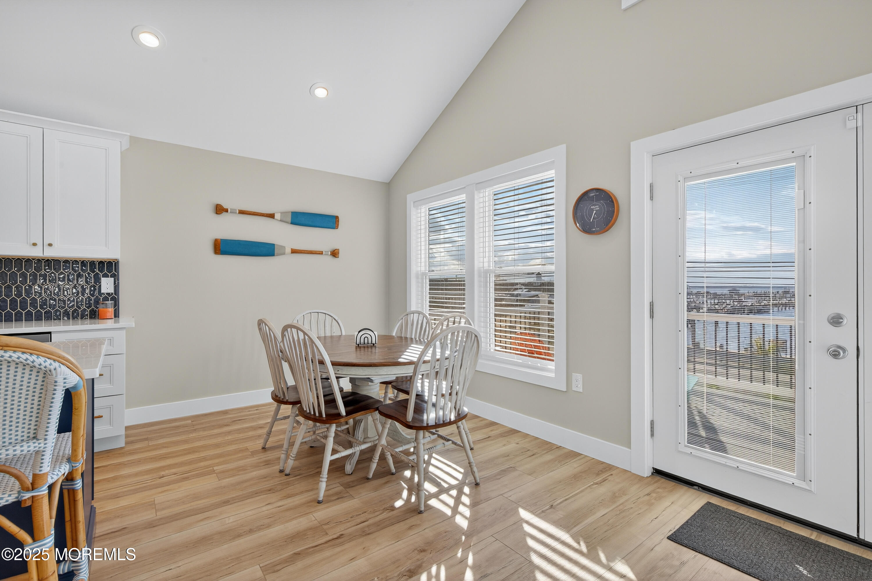 3255 Goa Way Lavallette, NJ 08735 - Photo 6 of 34 a view of a dining room with furniture window and wooden floor