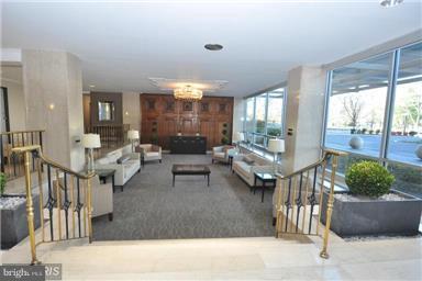 1900 Lyttonsville Road, Unit 610 Silver Spring, MD 20910 - Photo 2 of 2 a living room with furniture and a large window