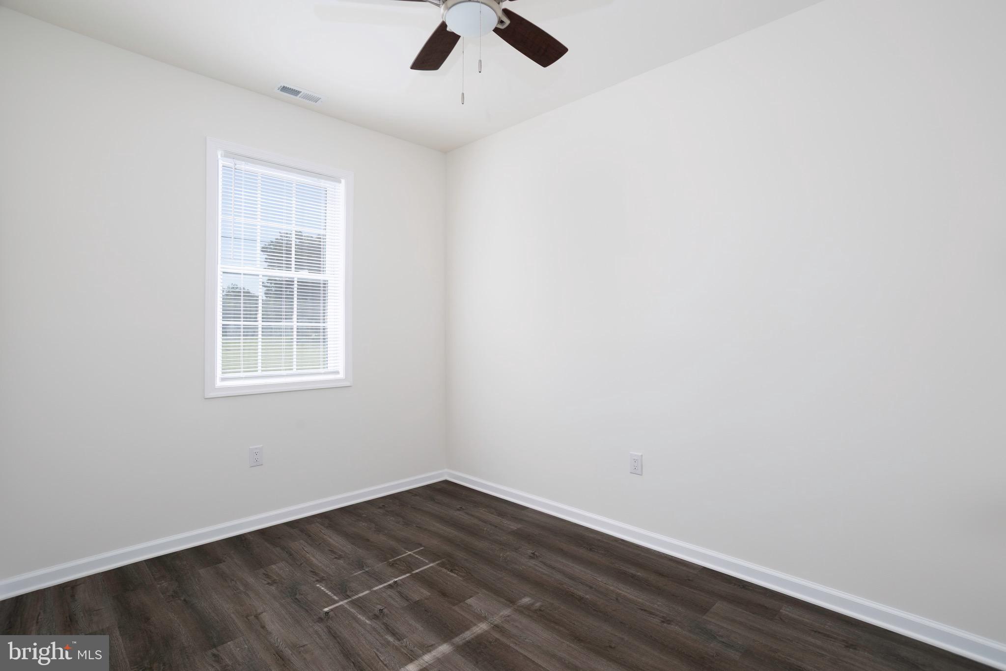453 Willis Street Cambridge, MD 21613 - Photo 18 of 18 an empty room with a window
