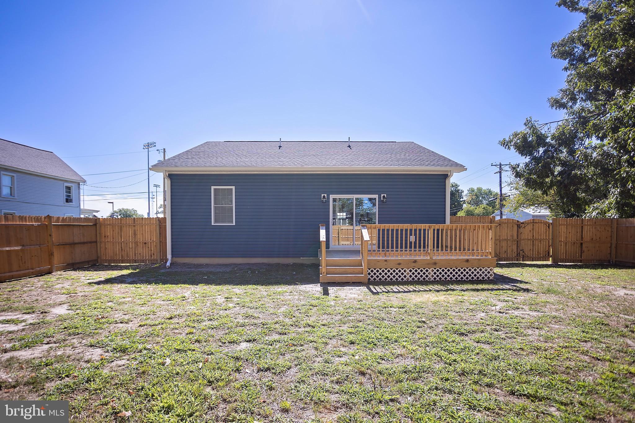 453 Willis Street Cambridge, MD 21613 - Photo 6 of 18 a front view of a house with a yard
