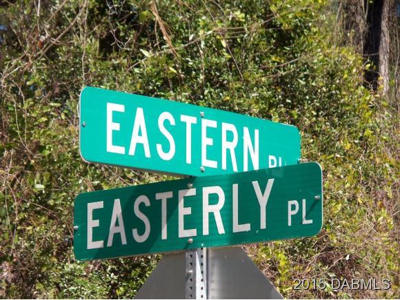 4 Eastern Place Palm Coast, FL 32164 - Photo 9 of 10 a street sign that is on a pole