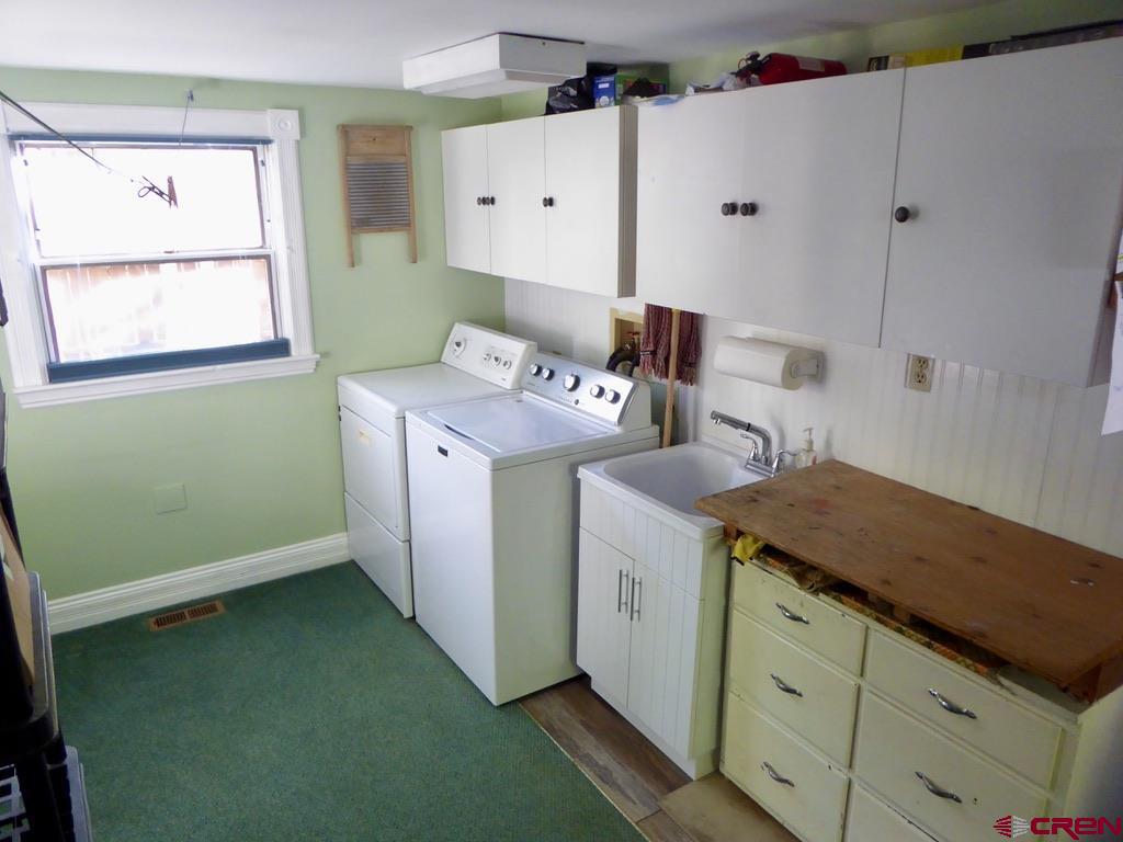 2 River Street Silverton, CO 81433 - Photo 14 of 36 a utility room with dryer and washer