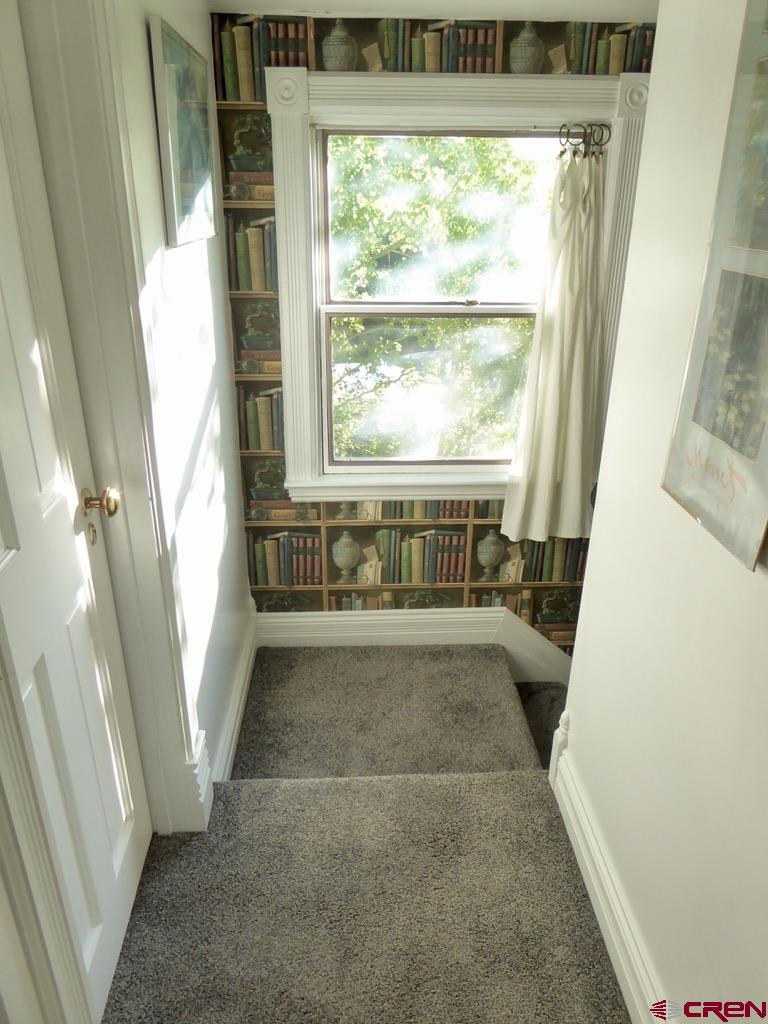 2 River Street Silverton, CO 81433 - Photo 24 of 36 a bathroom with a tub sink and window