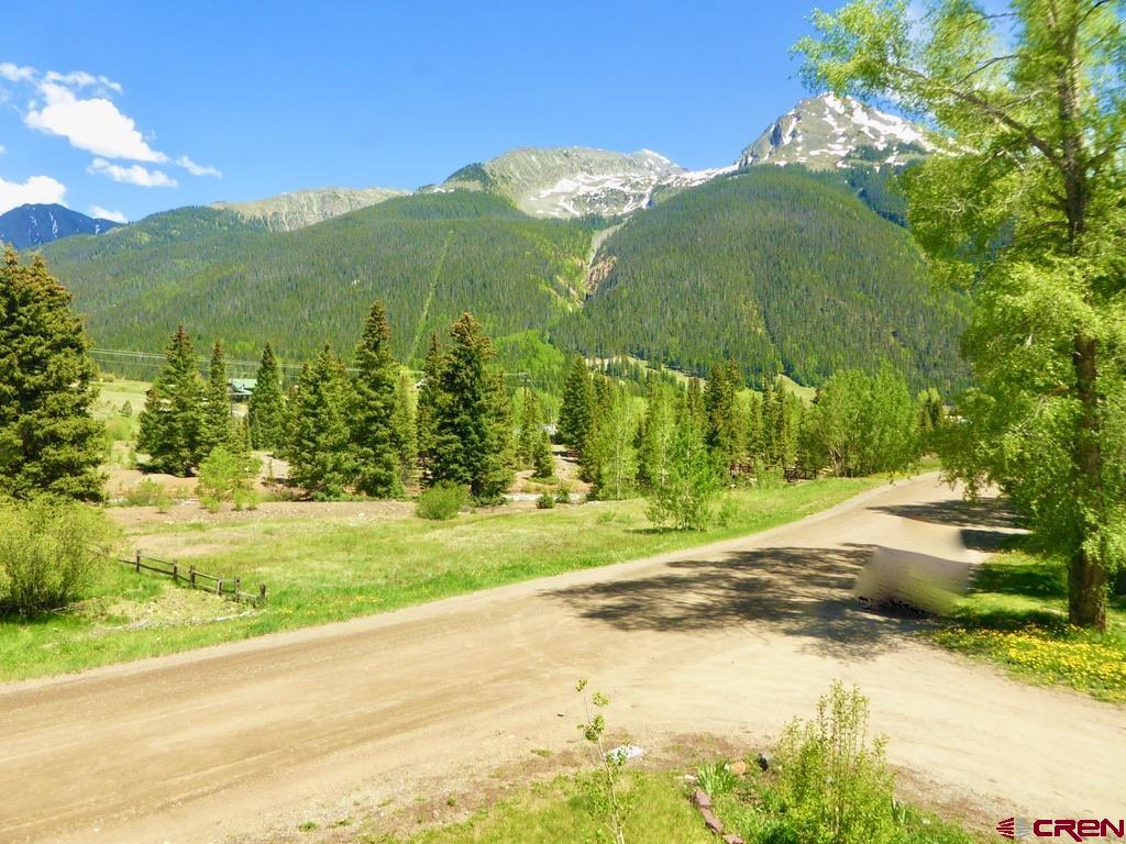 2 River Street Silverton, CO 81433 - Photo 30 of 36 a view of a house with a yard and a lake view