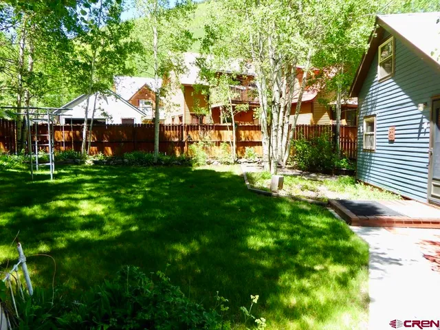 a view of outdoor space and yard