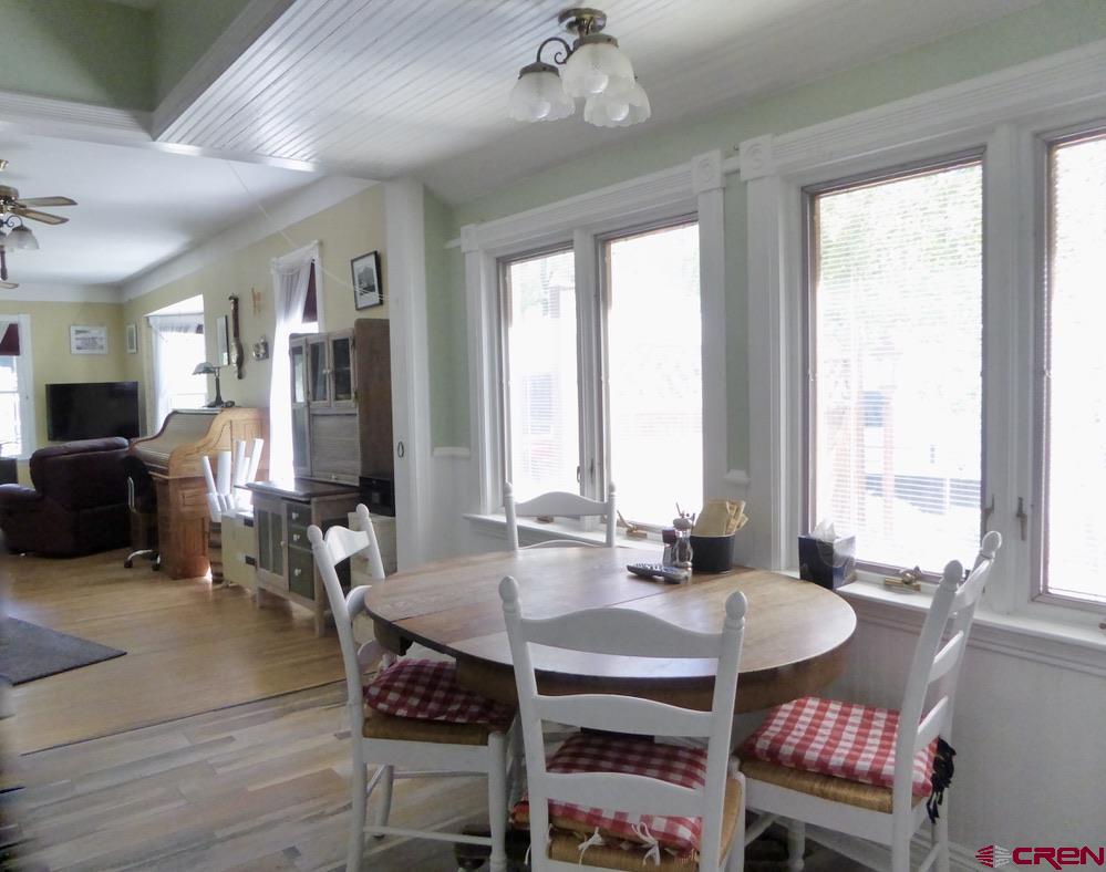 2 River Street Silverton, CO 81433 - Photo 8 of 36 a view of a dining room with furniture window and wooden floor