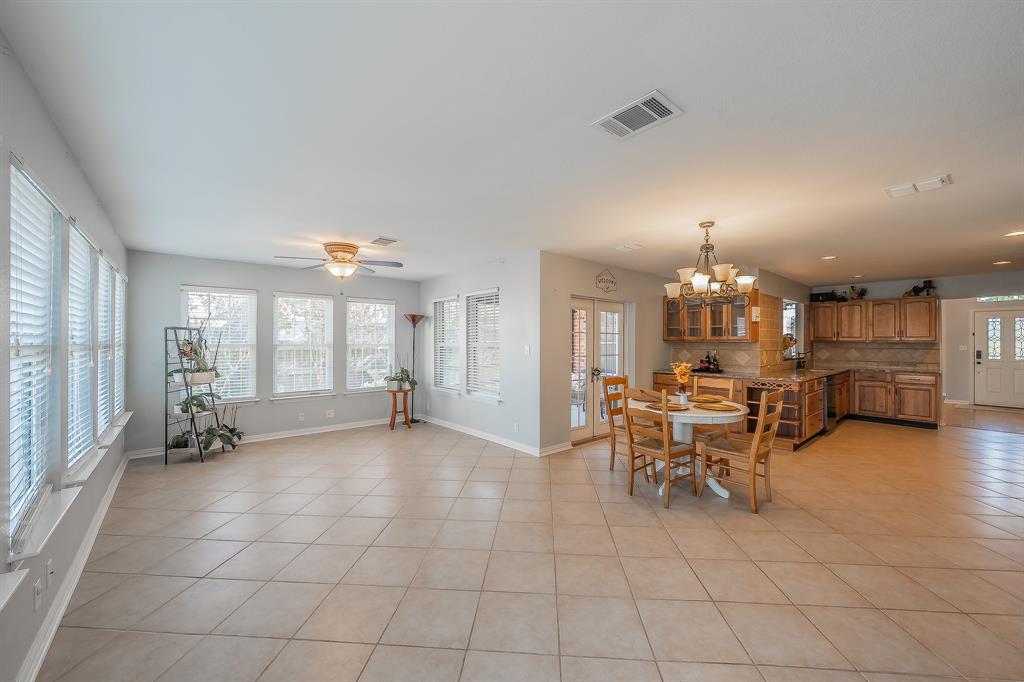 4425 Maple Shade Avenue Sachse, TX 75048 - Photo 14 of 40 a view of a livingroom with furniture and a window