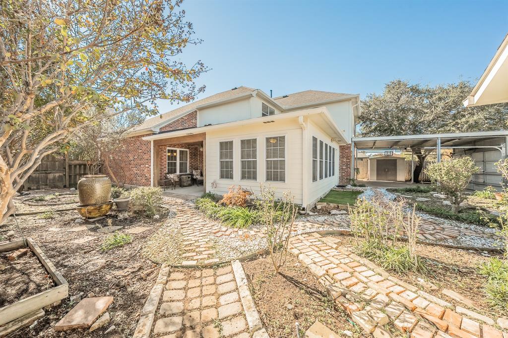 4425 Maple Shade Avenue Sachse, TX 75048 - Photo 31 of 40 a front view of a house with a yard