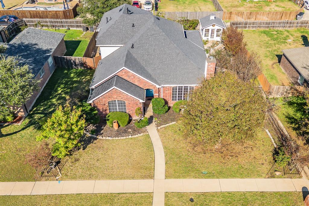 4425 Maple Shade Avenue Sachse, TX 75048 - Photo 38 of 40 a aerial view of a house with a yard