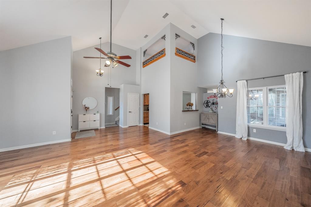 4425 Maple Shade Avenue Sachse, TX 75048 - Photo 4 of 40 a view of a livingroom with a chandelier