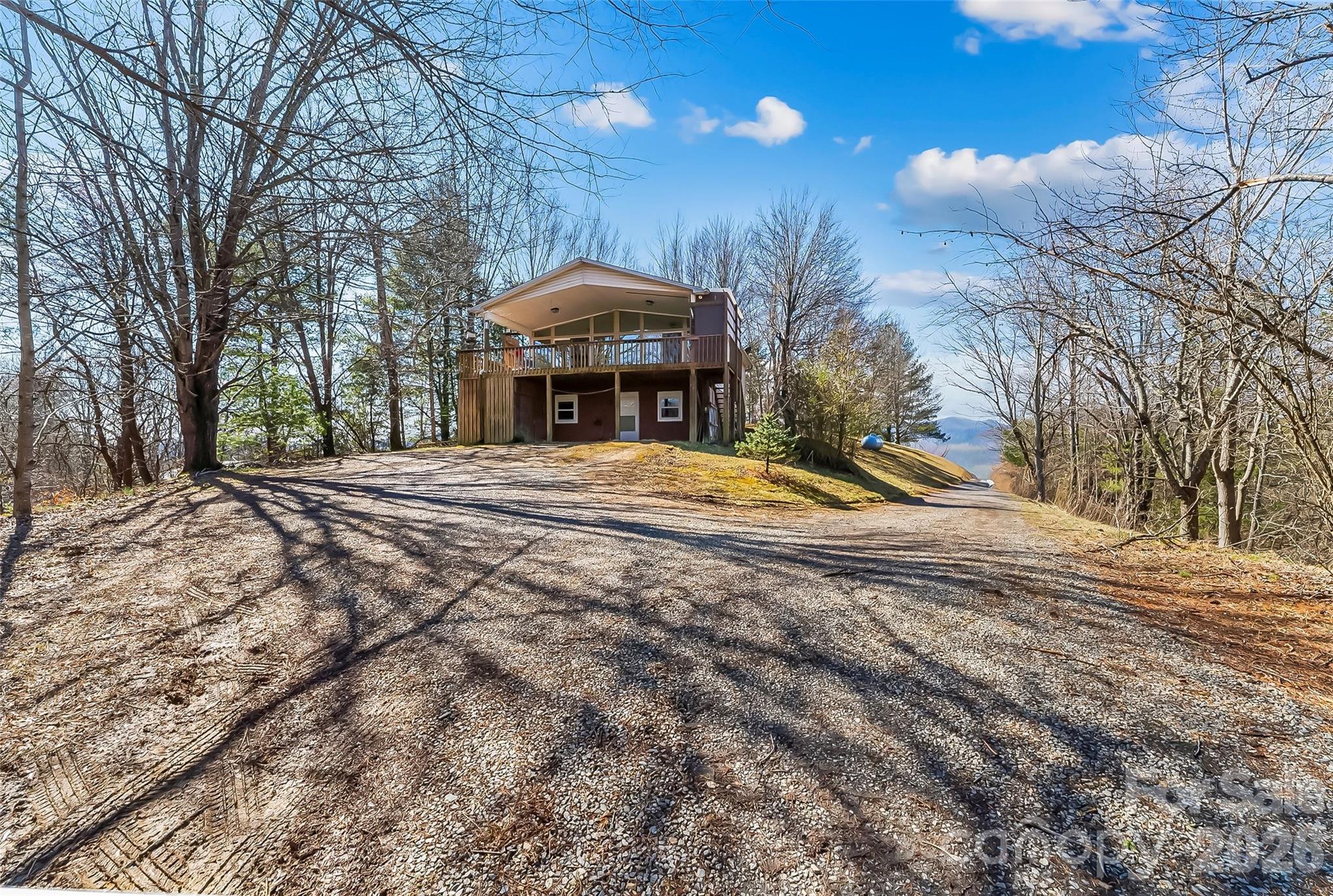 350 Sandy Bottom Road Marshall, NC 28753 - Photo 2 of 40 a view of a house with snow on the ground