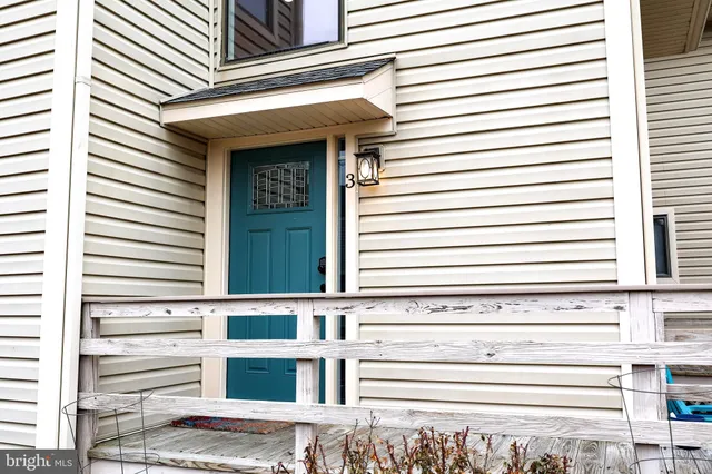 a view of a house with a large window