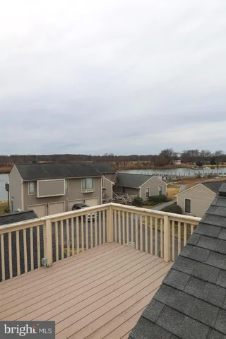 a balcony with a lake view