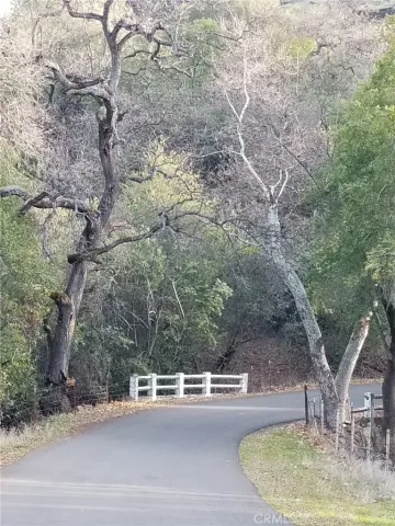 a view of a swimming pool with a yard