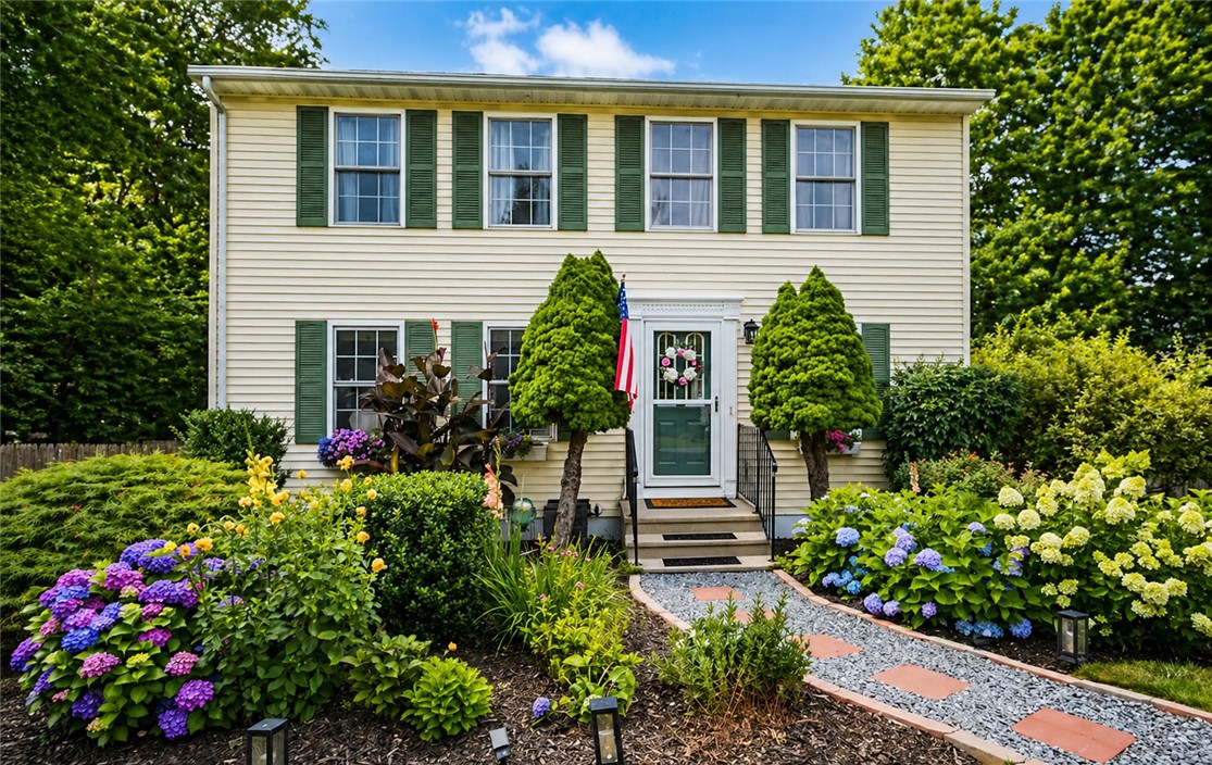 home is pictured in the summer time