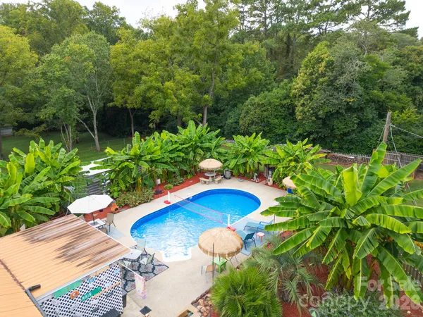 a view of outdoor space yard deck patio and swimming pool