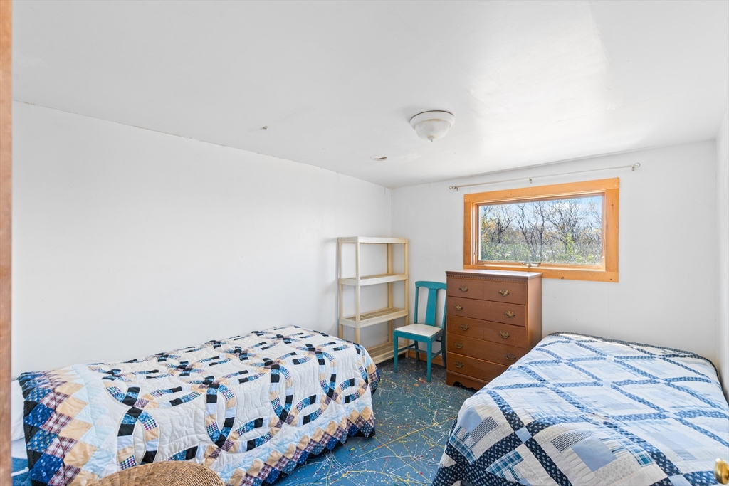 0 Bayberry Hill Road Cuttyhunk, MA 02713 - Photo 7 of 12 a bedroom with bed and a window