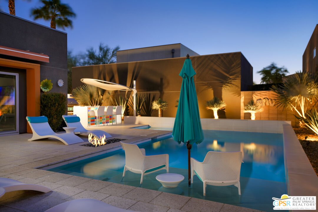 1069 Dane Drive Palm Springs, CA 92262 - Photo 14 of 51 a view of outdoor space yard deck patio and fire pit