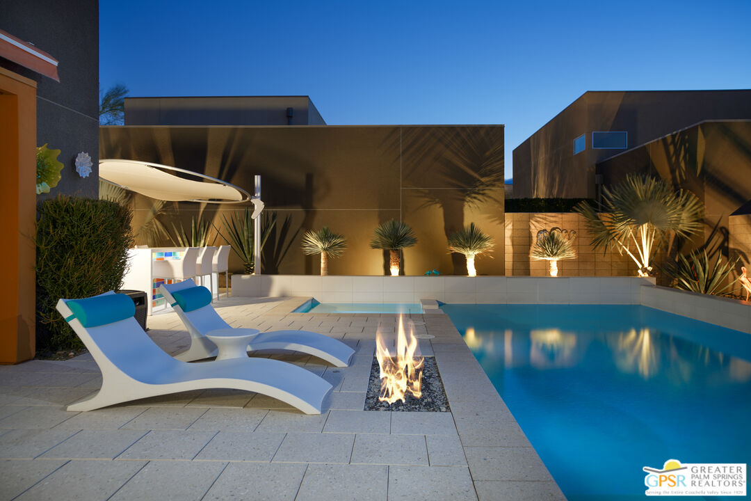 1069 Dane Drive Palm Springs, CA 92262 - Photo 16 of 51 a view of outdoor space yard deck patio and fire pit