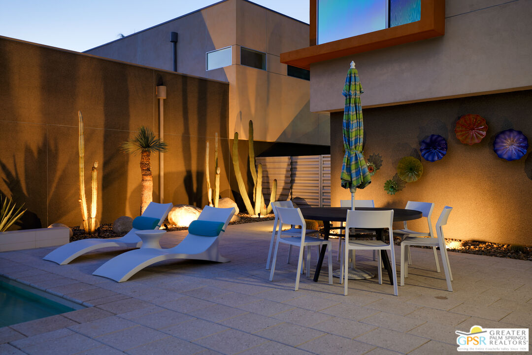 1069 Dane Drive Palm Springs, CA 92262 - Photo 18 of 51 a dining room with furniture and a window