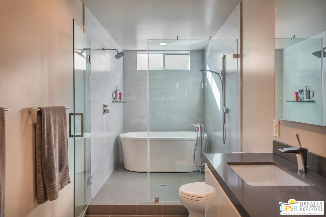 1069 Dane Drive Palm Springs, CA 92262 - Photo 43 of 51 a bathroom with a sink a toilet and shower