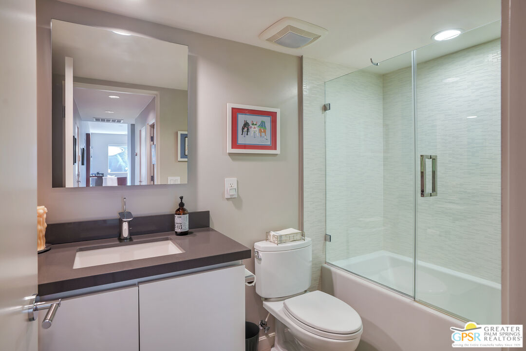 1069 Dane Drive Palm Springs, CA 92262 - Photo 49 of 51 a bathroom with a sink a toilet and shower
