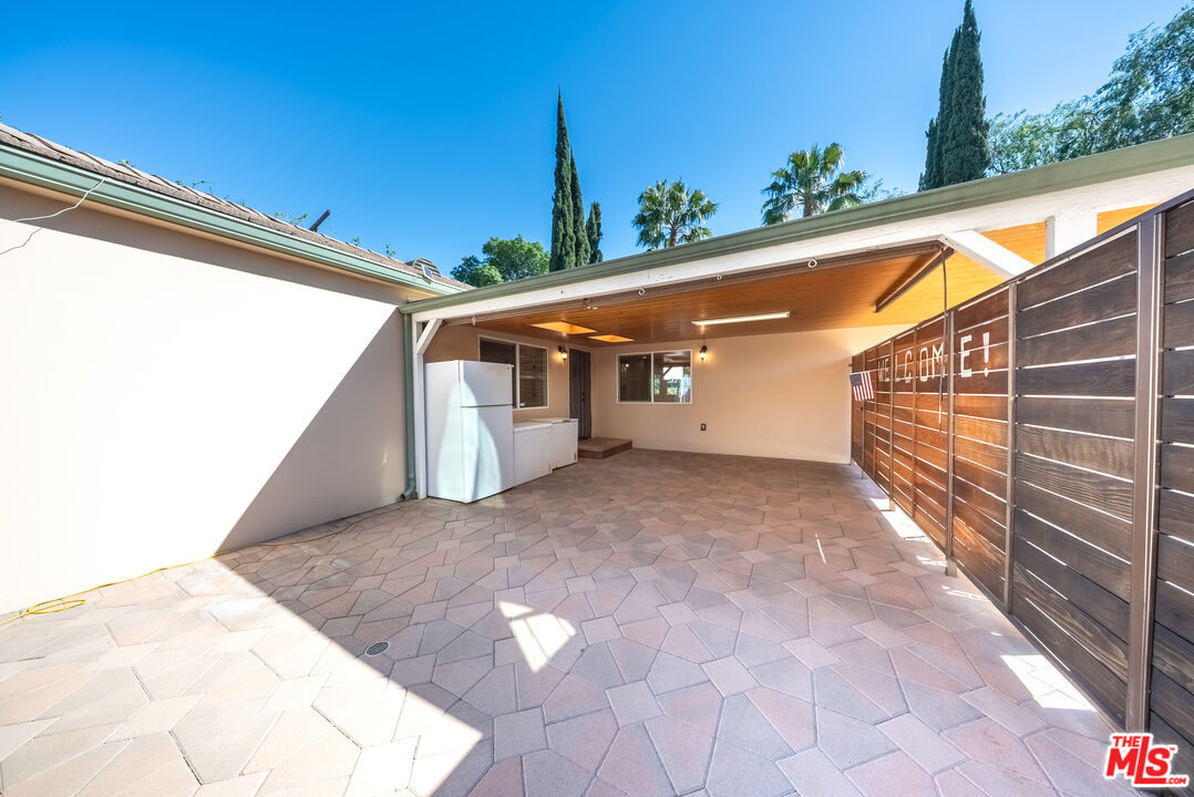 13847 Gilmore Street Van Nuys, CA 91401 - Photo 20 of 43 a view of balcony with a potted plant