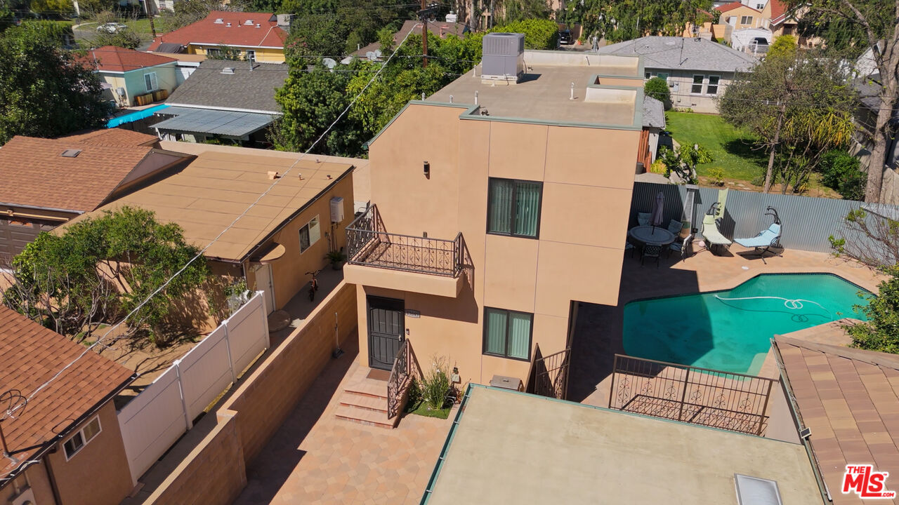 13847 Gilmore Street Van Nuys, CA 91401 - Photo 30 of 43 an aerial view of a house with outdoor space