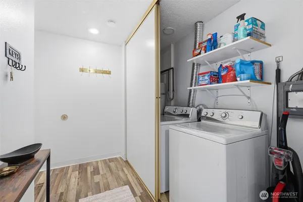 a storage room with washer and dryer